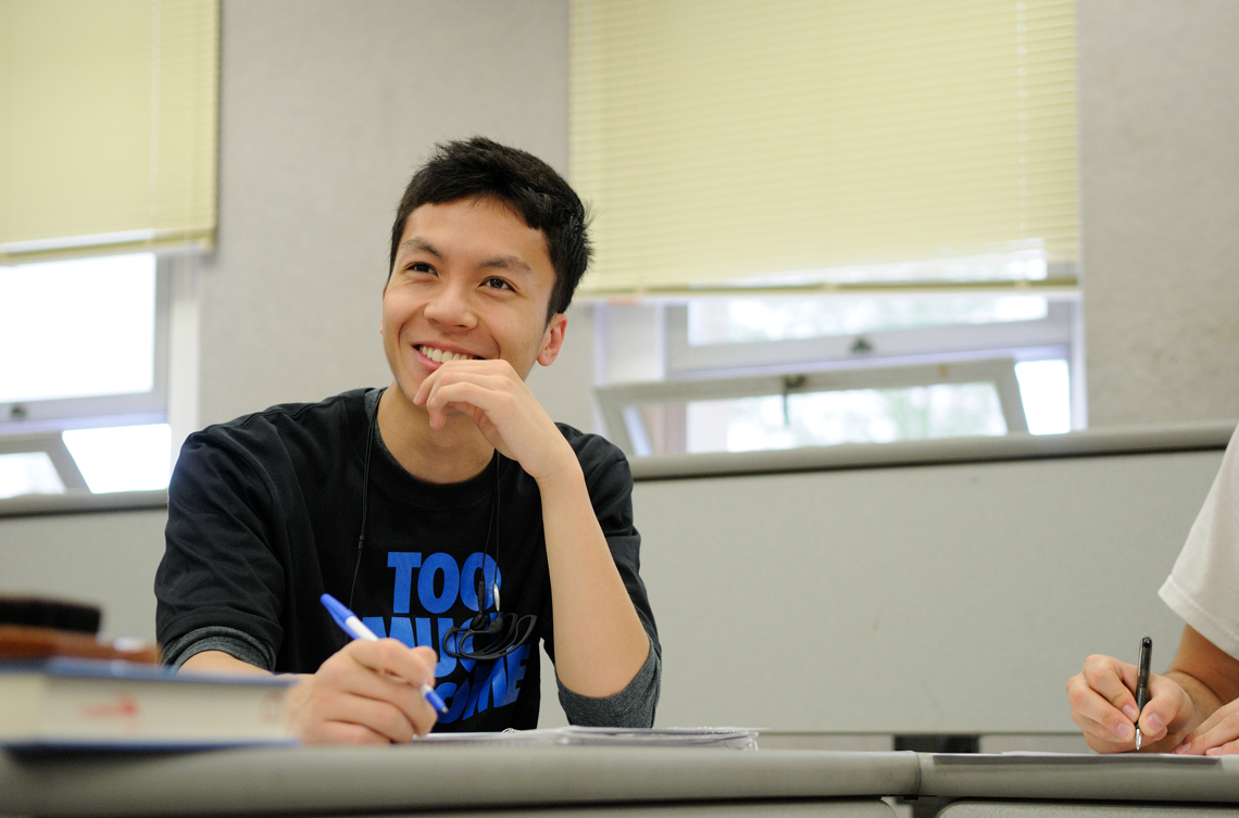 Student sitting in an Edwards Campus classroom