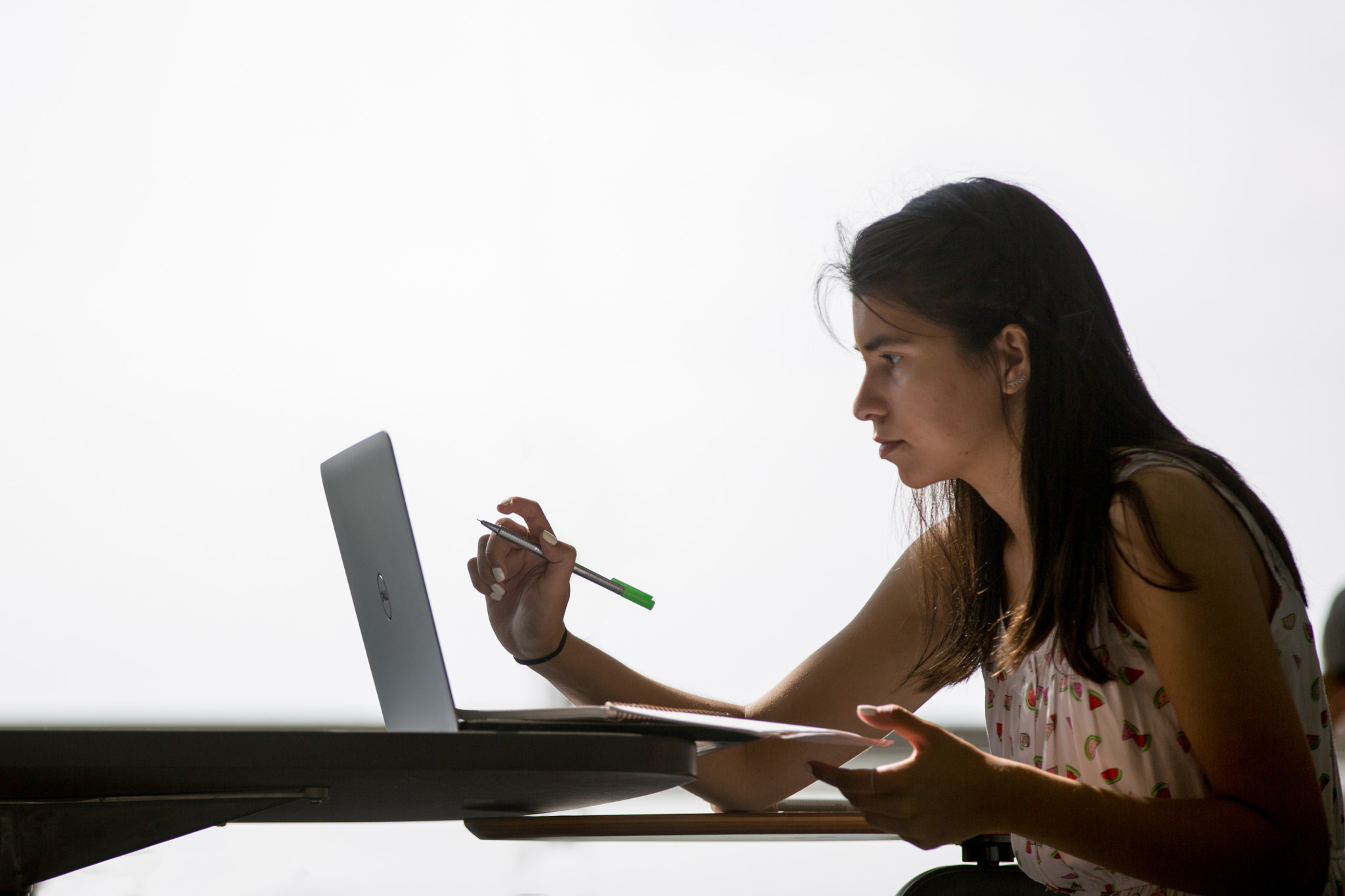 student working on a laptop