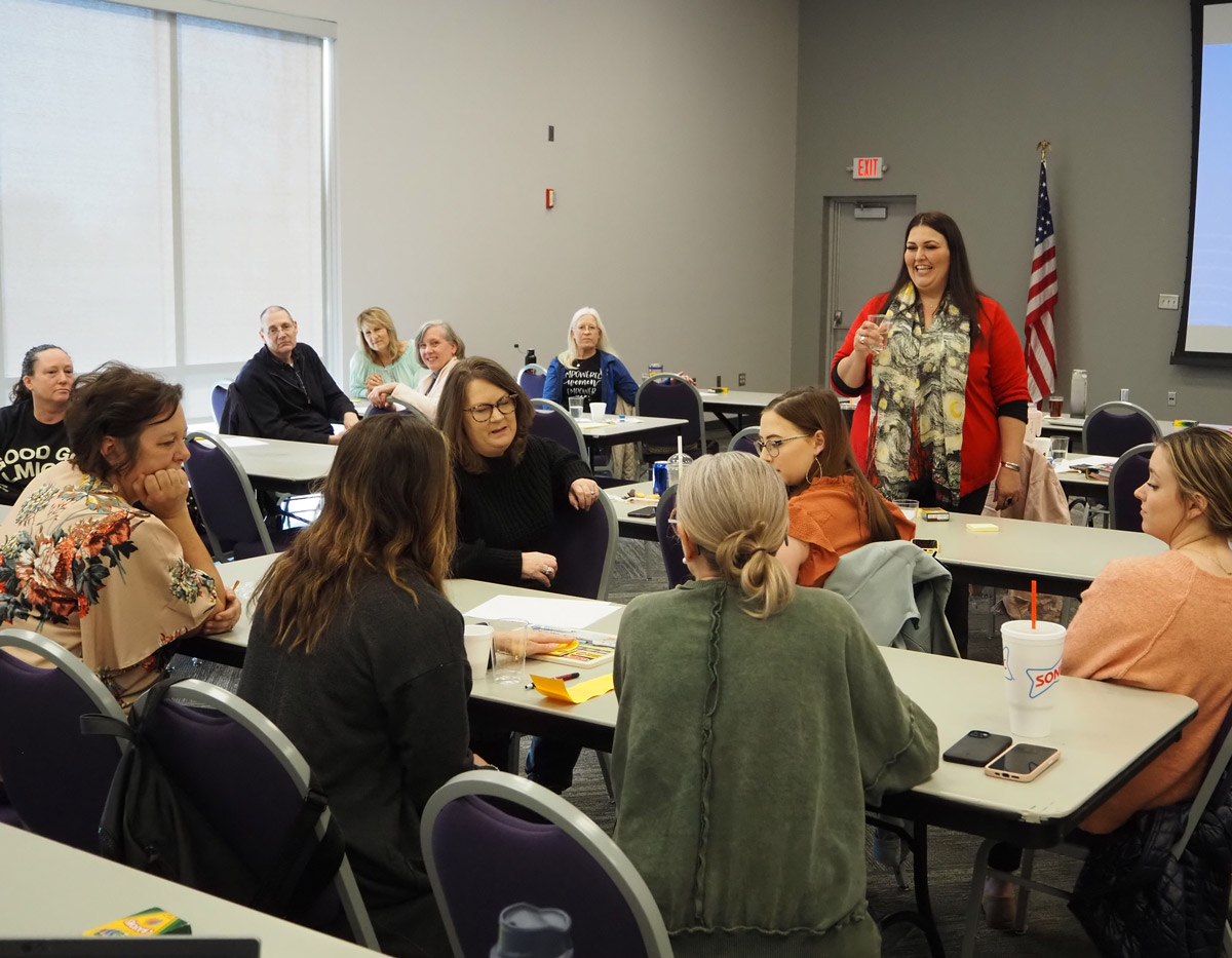 Professor Rebeca Sandoval leads a continuing education session in Salina