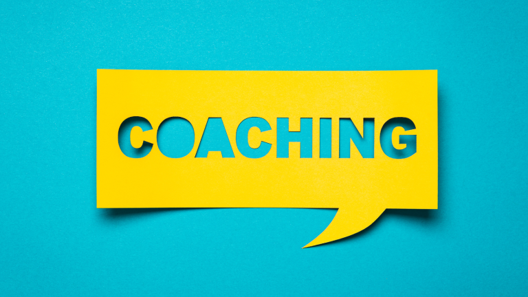 Yellow word bubble that says coaching